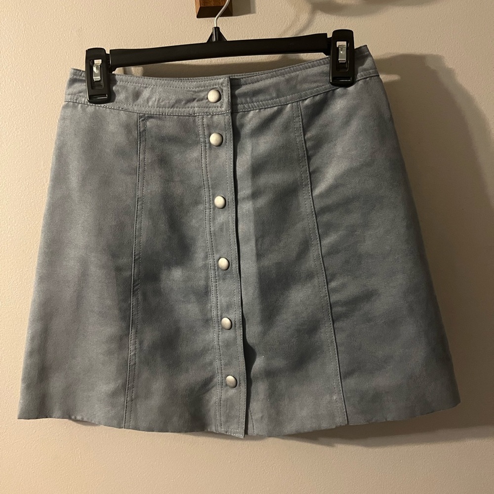 Blue suede snap mini skirt